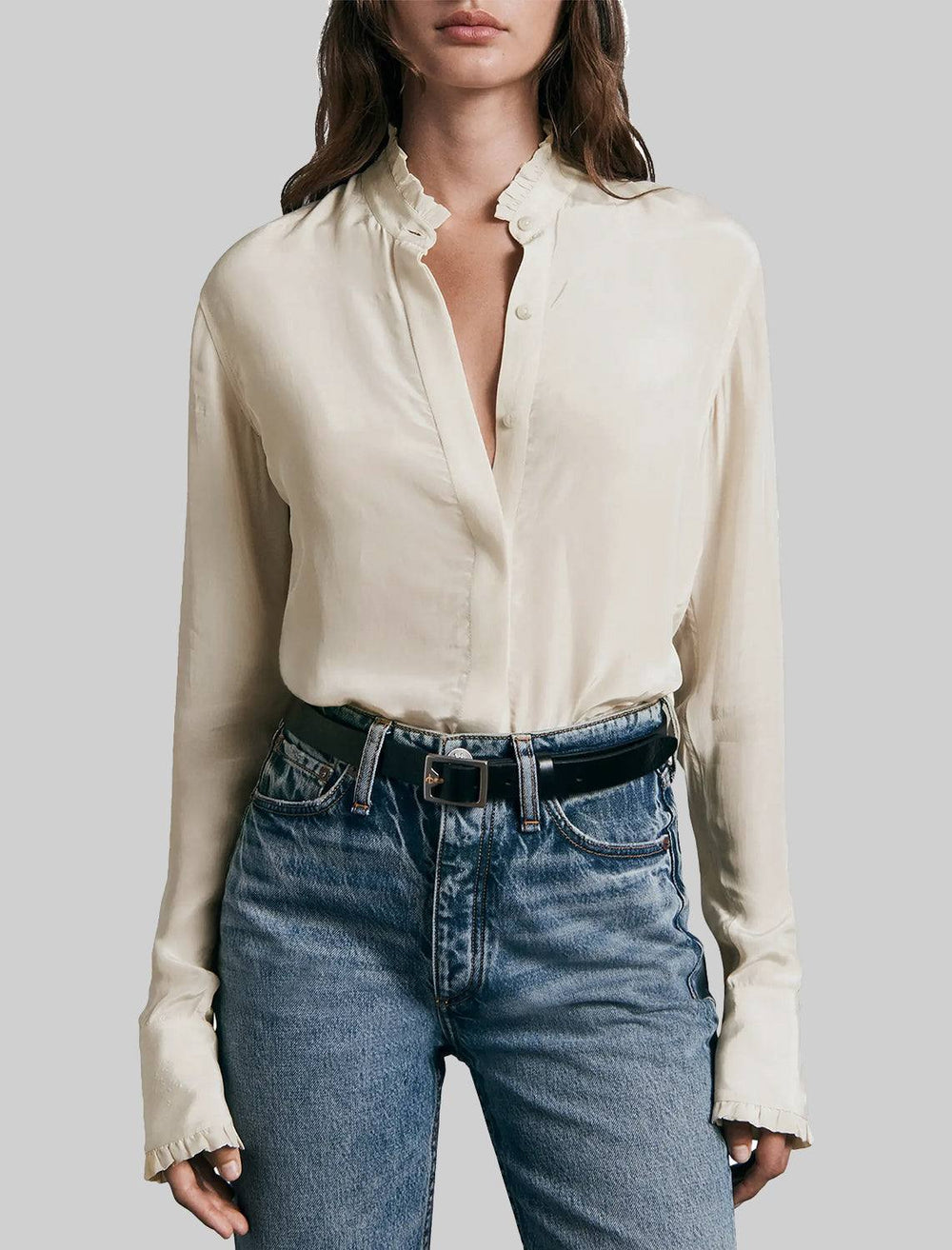 Model wearing Rag & Bone's jordan top in ivory.