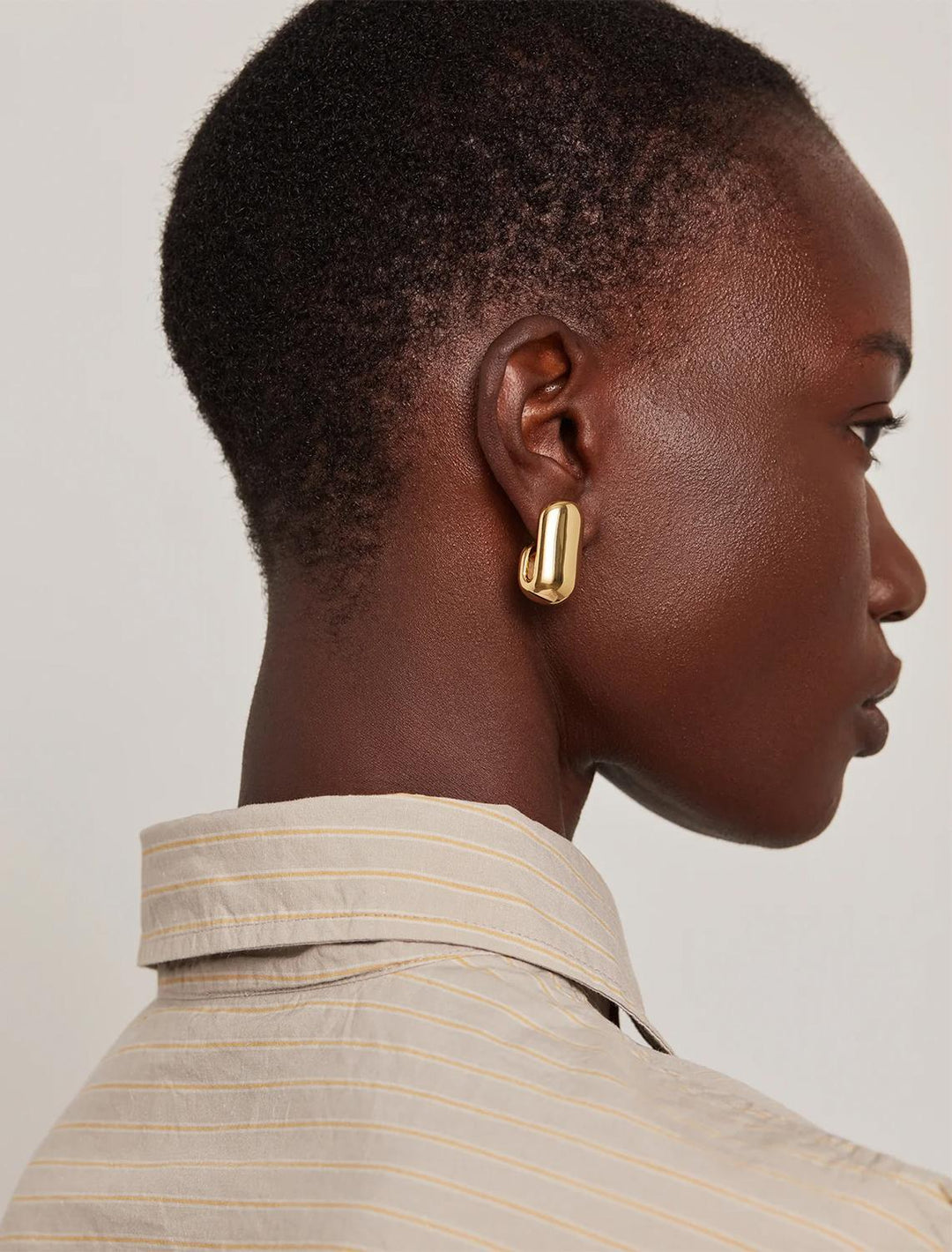 leon earrings in gold