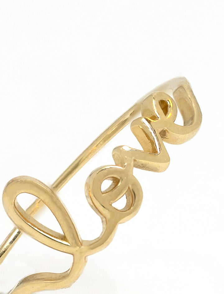 Close-up view of Sydney Evan's small pure love ring.