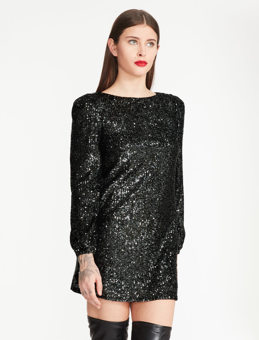 Model wearing Steve Madden's delorean dress in black.