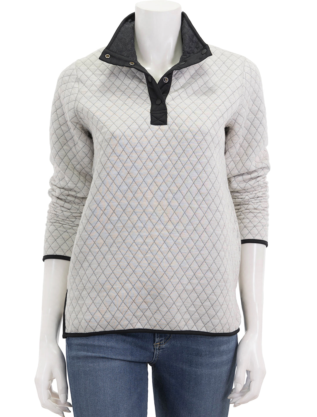 Front view of Marine Layer's corbet reversible pullover in white and black.