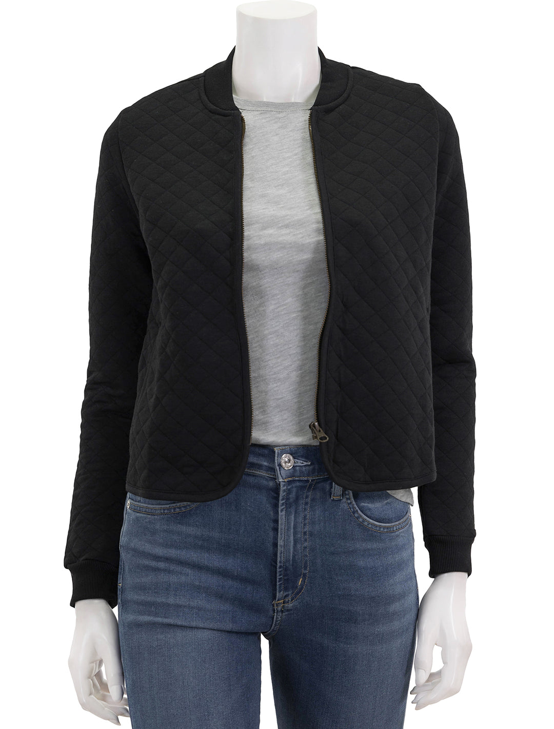Front view of Marine Layer's corbet quilted bomber in black.