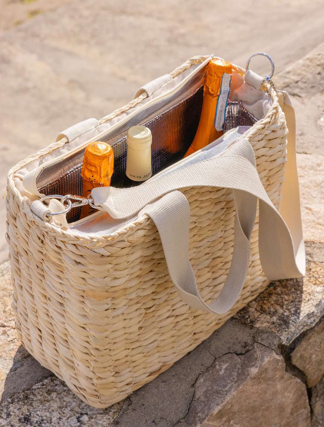Overhead view of Hat Attack's straw cooler tote in natural.
