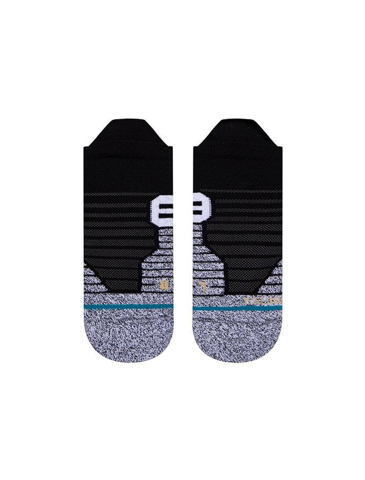 Front view of Stance's versa tab socks in black.
