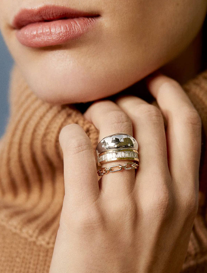 Model wearing Adina Reyter's celestial diamond large half dome ring in silver.