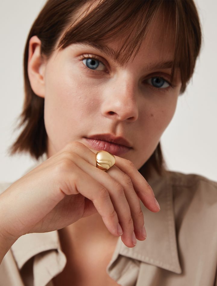 nelle ring in gold