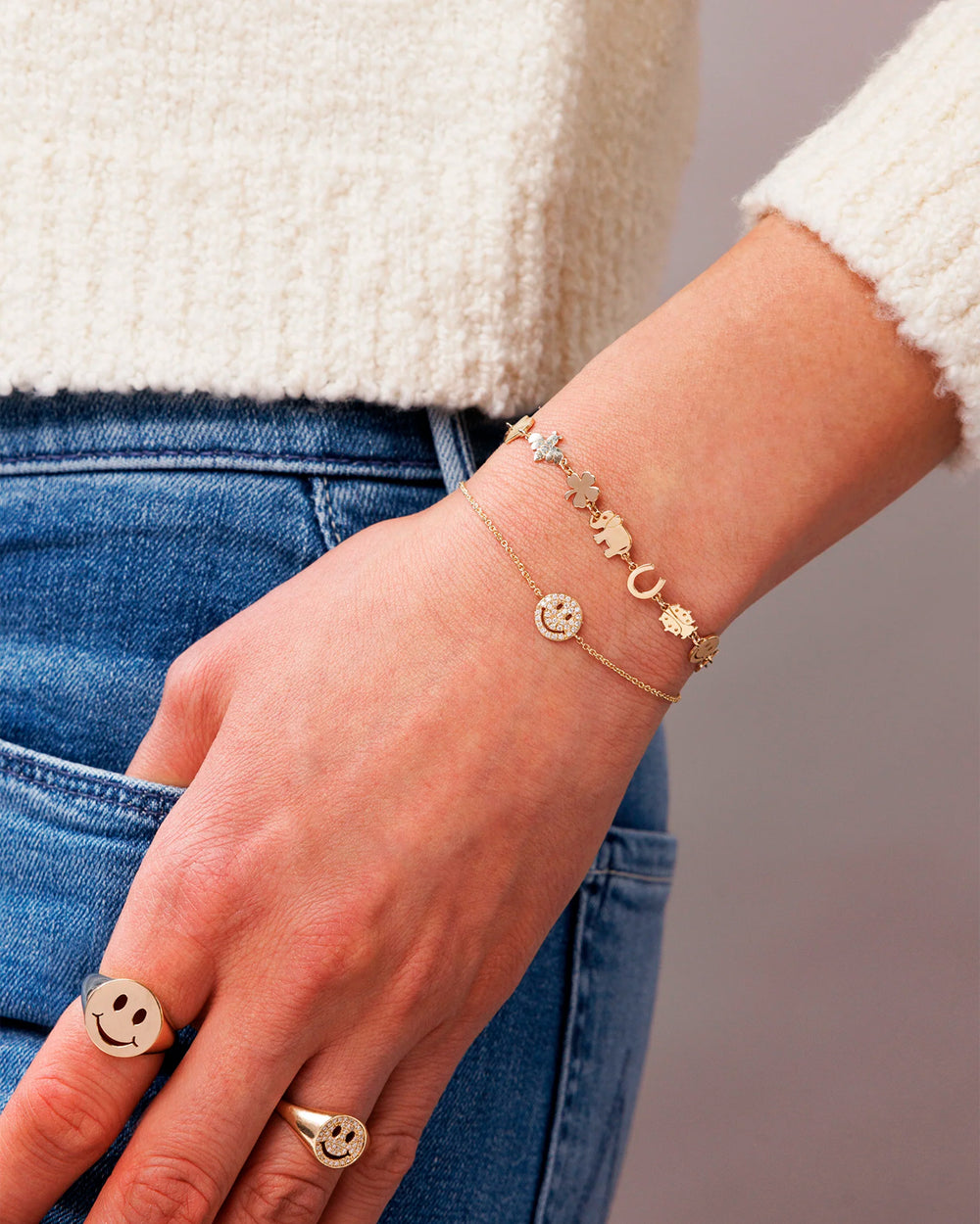 Model wearing Sydney Evan's tiny pure link bracelet (6.75").