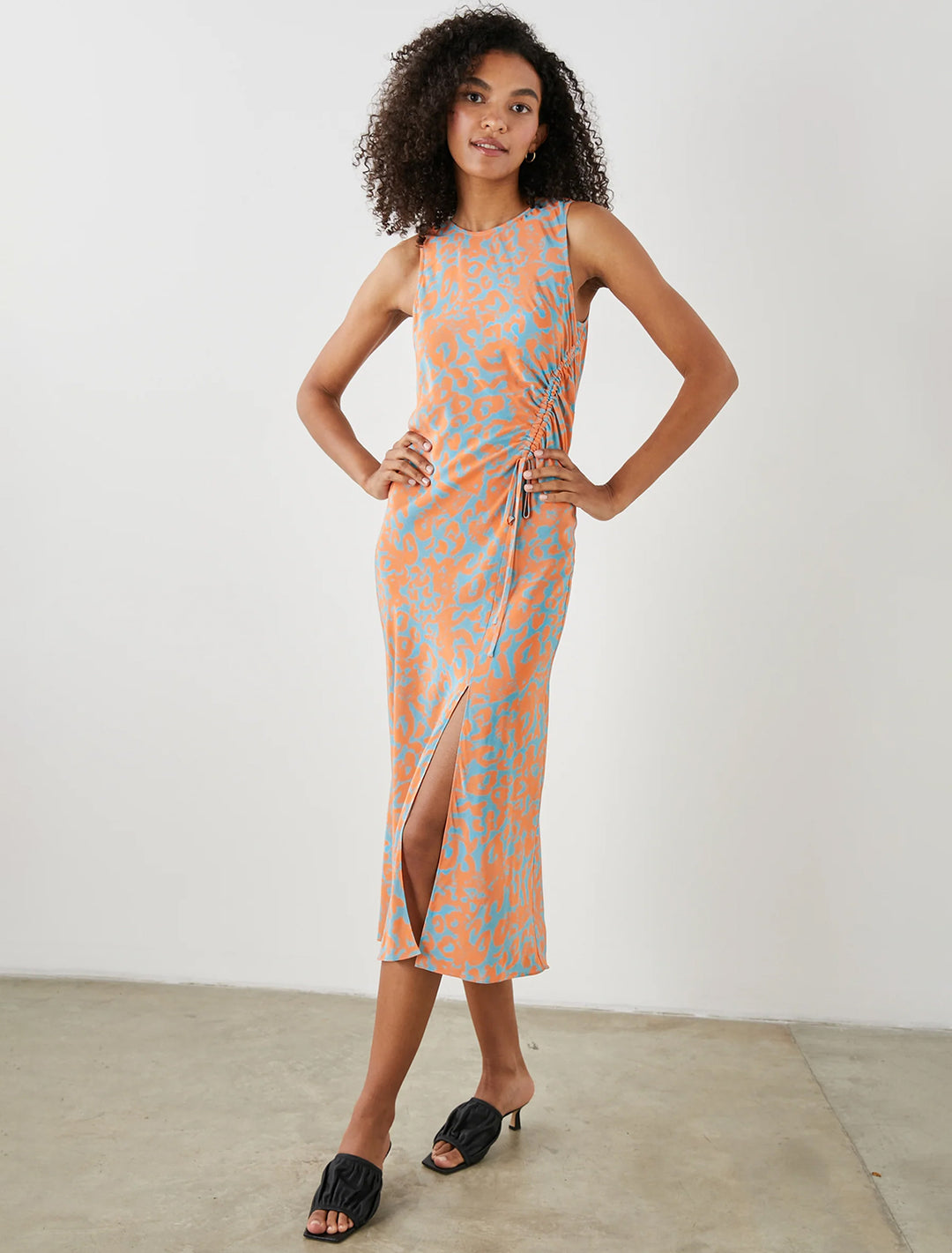 Model wearing Rails' gabriella dress in orange diffused cheetah.
