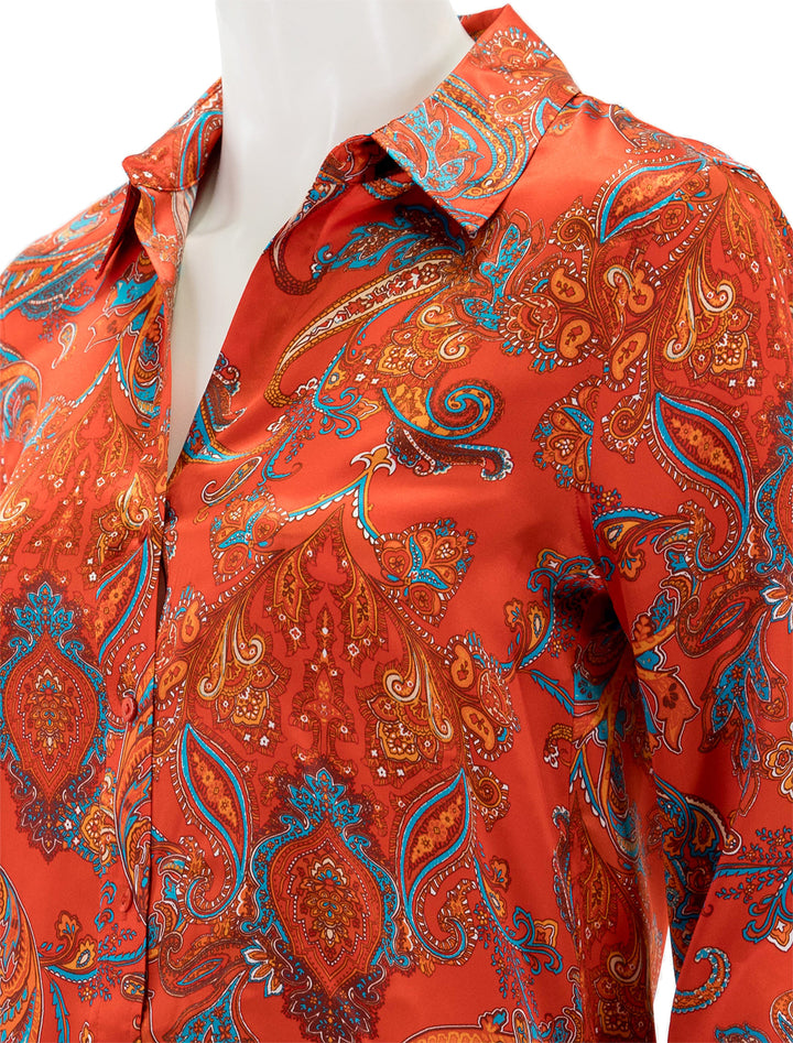 Close-up view of L'agence's dani shirt in fire red paisley.