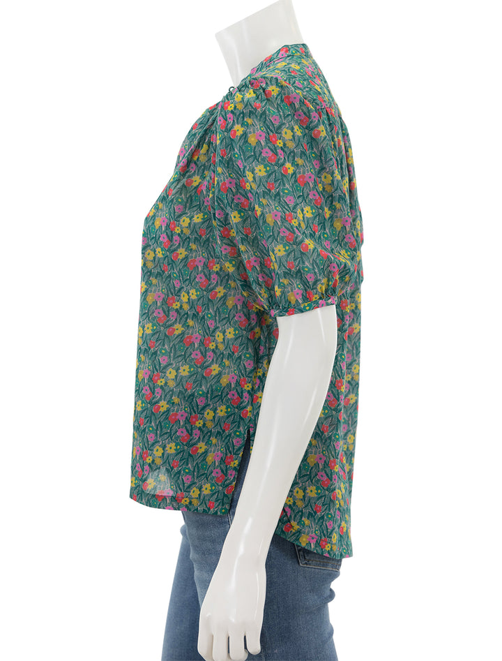 Side view of Birds of Paradis' aline blouse in bold leaflet.