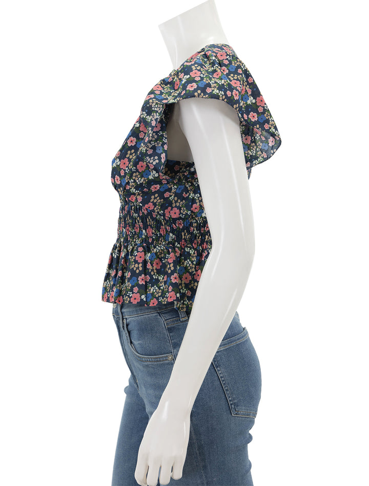 Side view of Birds of Paradis' paloma blouse in rolling hills.