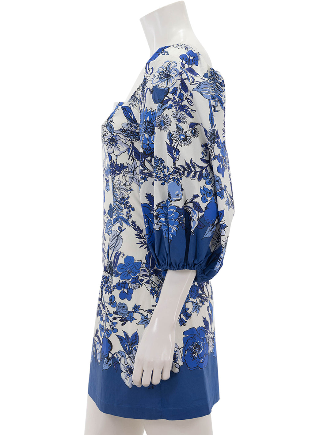 Side view of Cara Cara's montauk dress in flower grid blue.