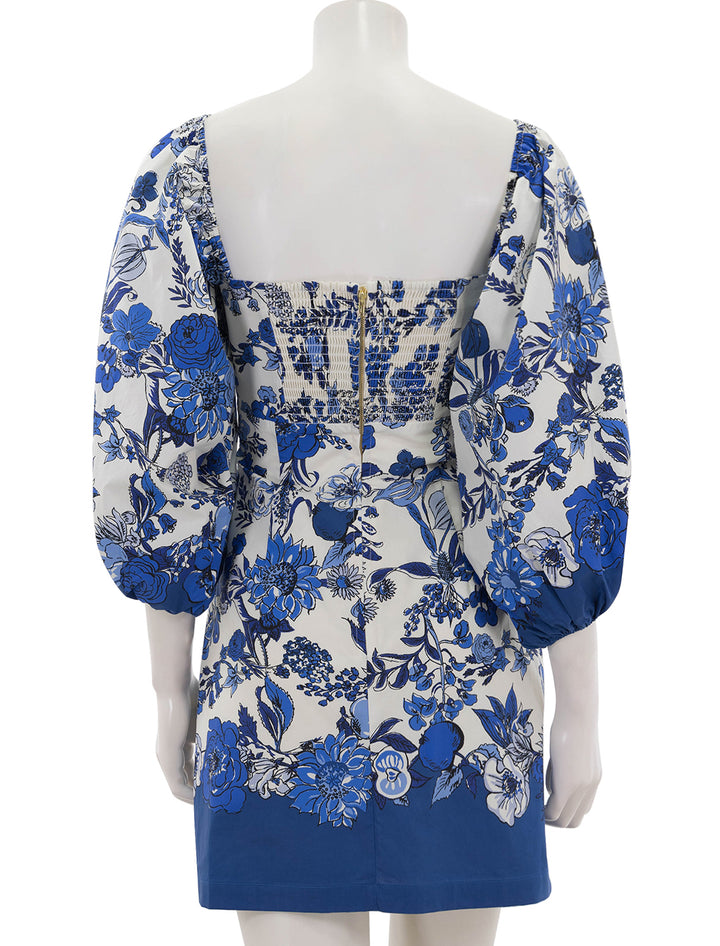 Back view of Cara Cara's montauk dress in flower grid blue.