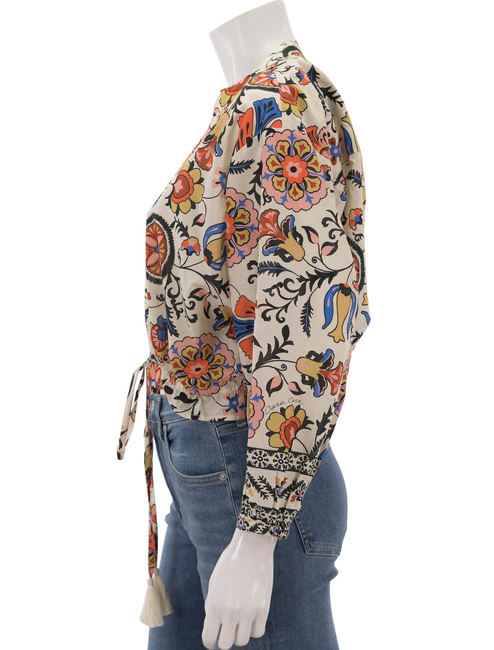 Side view of Cara Cara's perrin top in turtledove botanical medallion.