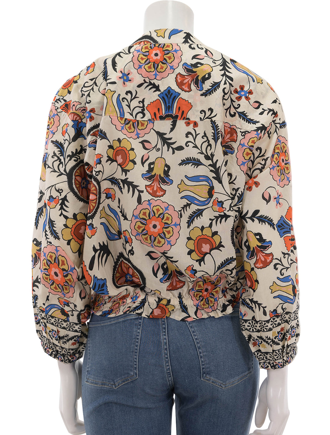 Back view of Cara Cara's perrin top in turtledove botanical medallion.