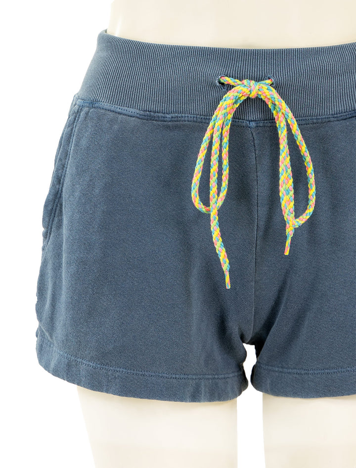 Close-up view of Sundry's drawstring shorts in pigment nightshade.