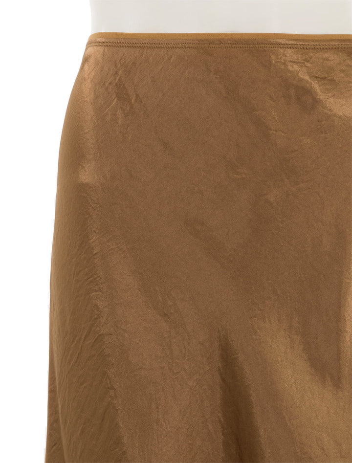 Close-up view of Vince's chiffon trim slip skirt in nile.