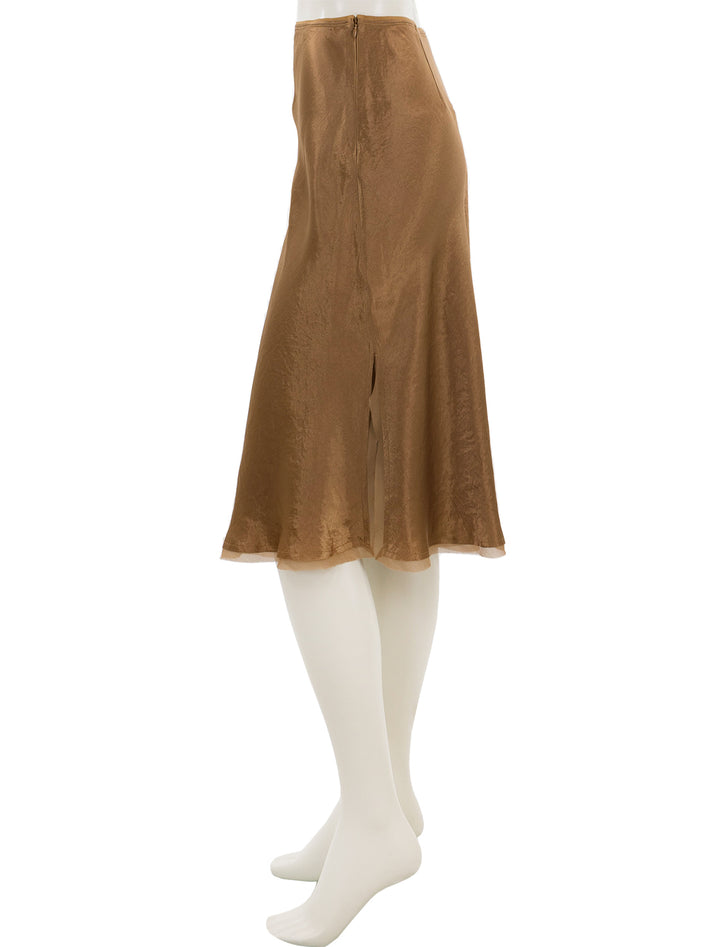 Side view of Vince's chiffon trim slip skirt in nile.