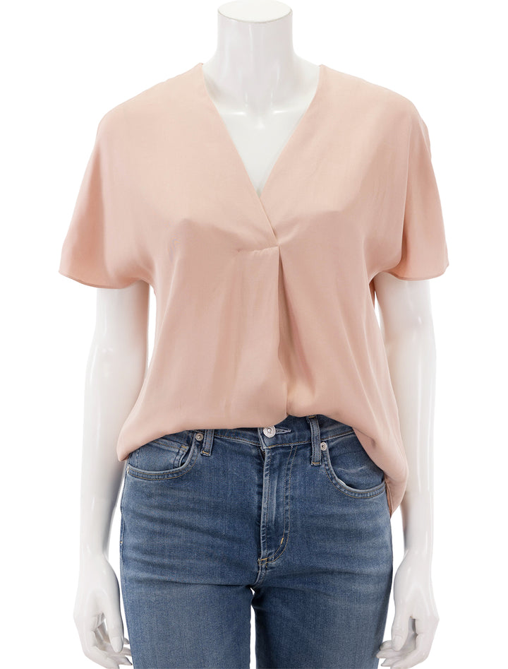 Front view of Vince's short sleeve v neck blouse in tuberose.