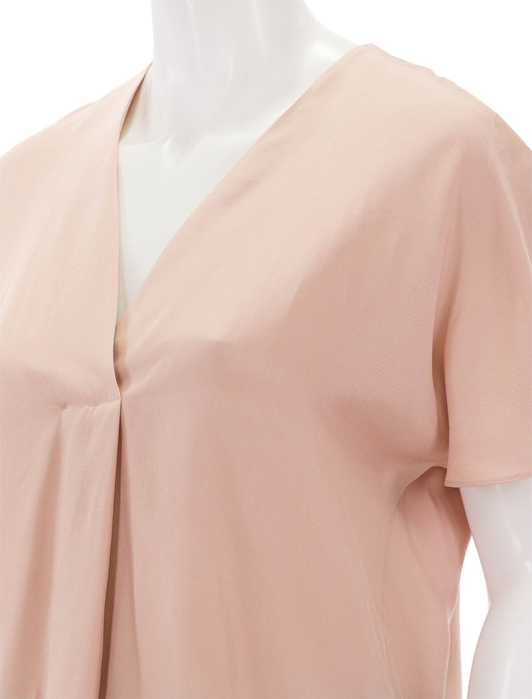 Close-up view of Vince's short sleeve v neck blouse in tuberose.