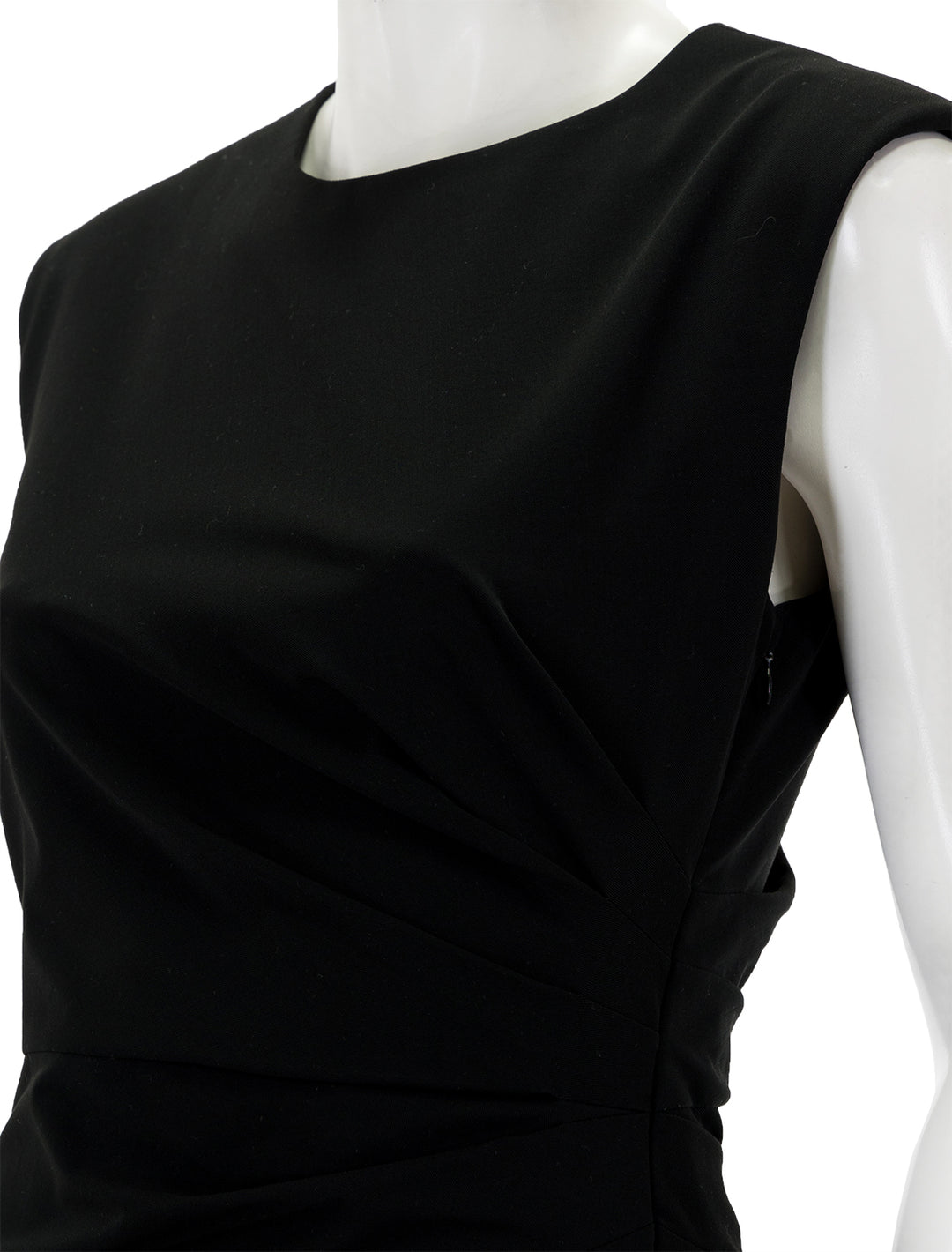 Close-up view of Veronica Beard's latiki dress in black.