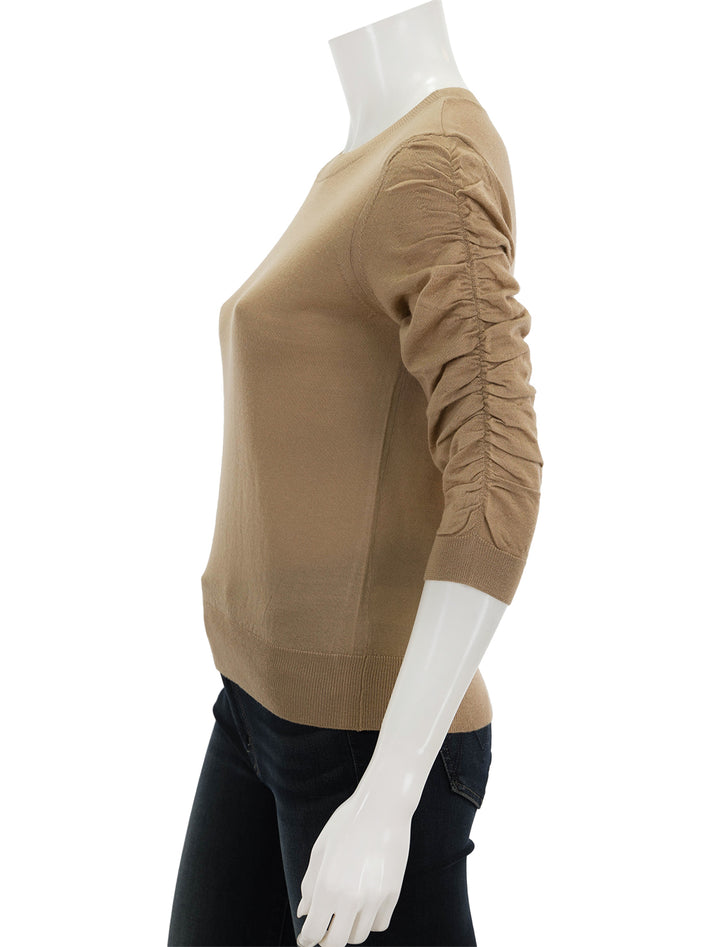 Side view of Veronica Beard's kase pullover in camel.