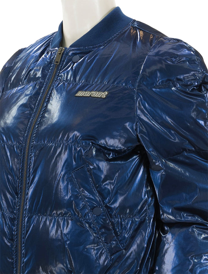 close up view of cody puffer jacket in electric blue