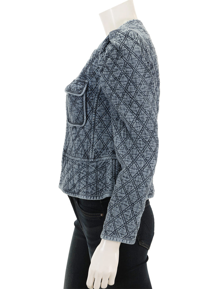 Side view of  Isabel Marant Etoile's deliona jacket in light blue denim quilting.