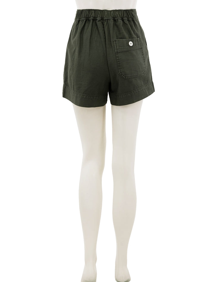 Back view of Alex Mill's alessandra pull-on shorts in pine needle.