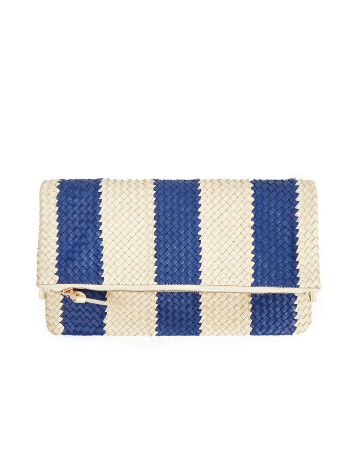 Front view of Clare V.'s foldover clutch with tabs in indigo and cream woven racing stripes, folded.