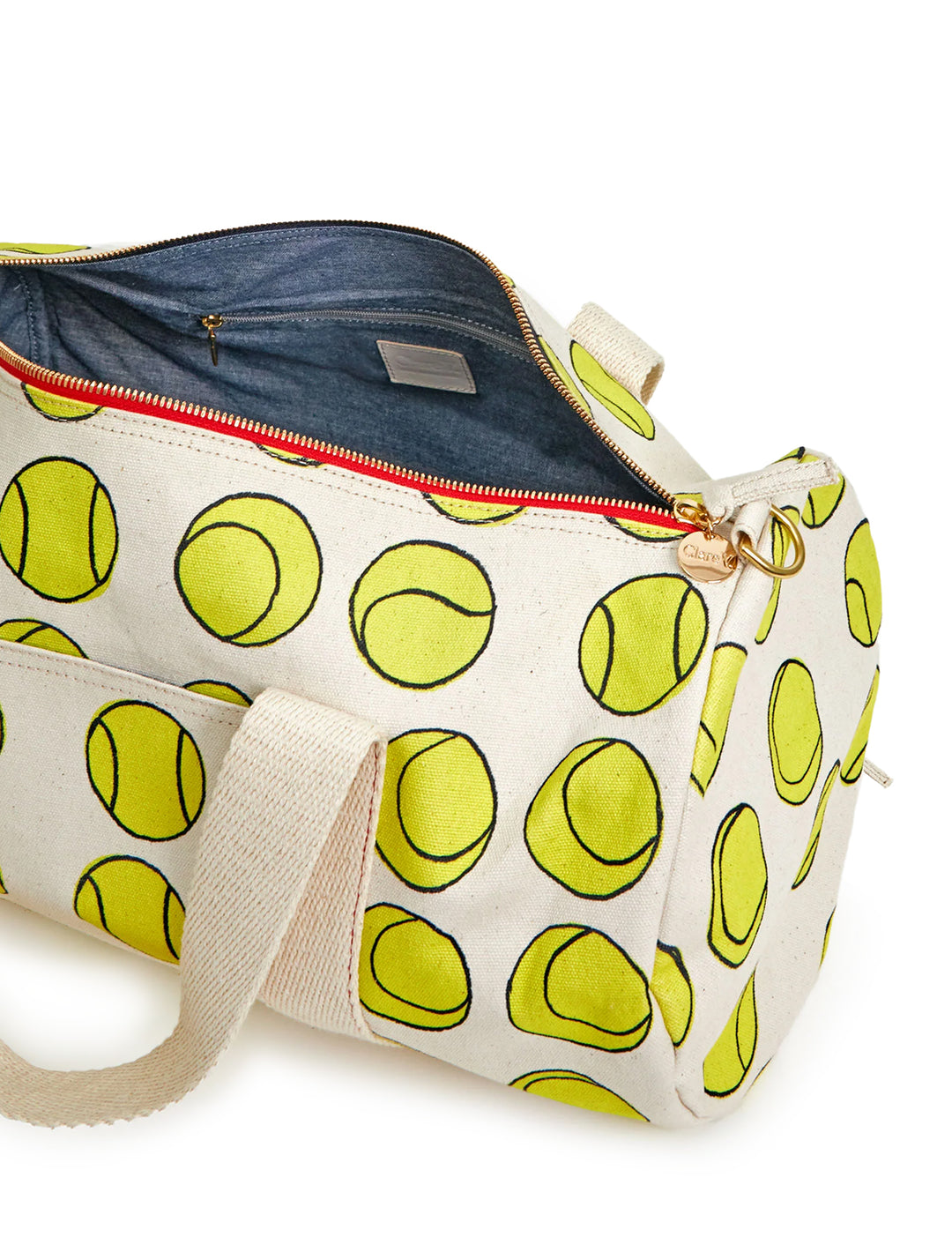 Close-up view of Clare V.'s tennis balls duffle bag.