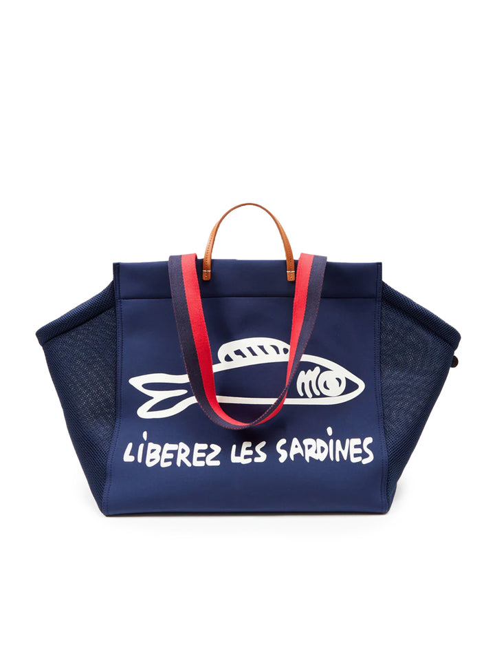 Front view of Clare V.'s trucker beach tote liberez les sardines.