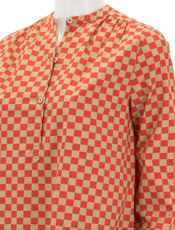 Close-up view of Clare V.'s st. martin top in poppy and khaki checker.