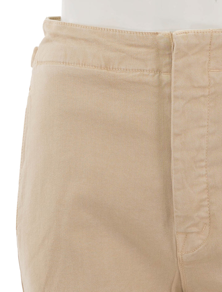 Close-up view of Mother Denim's the cinch greaser ankle in marzipan.