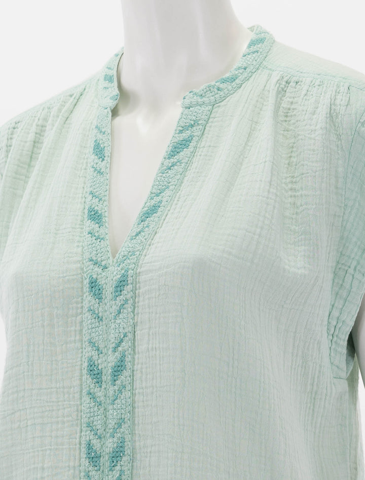 Close-up view of Faherty's lucia top in surf spray.