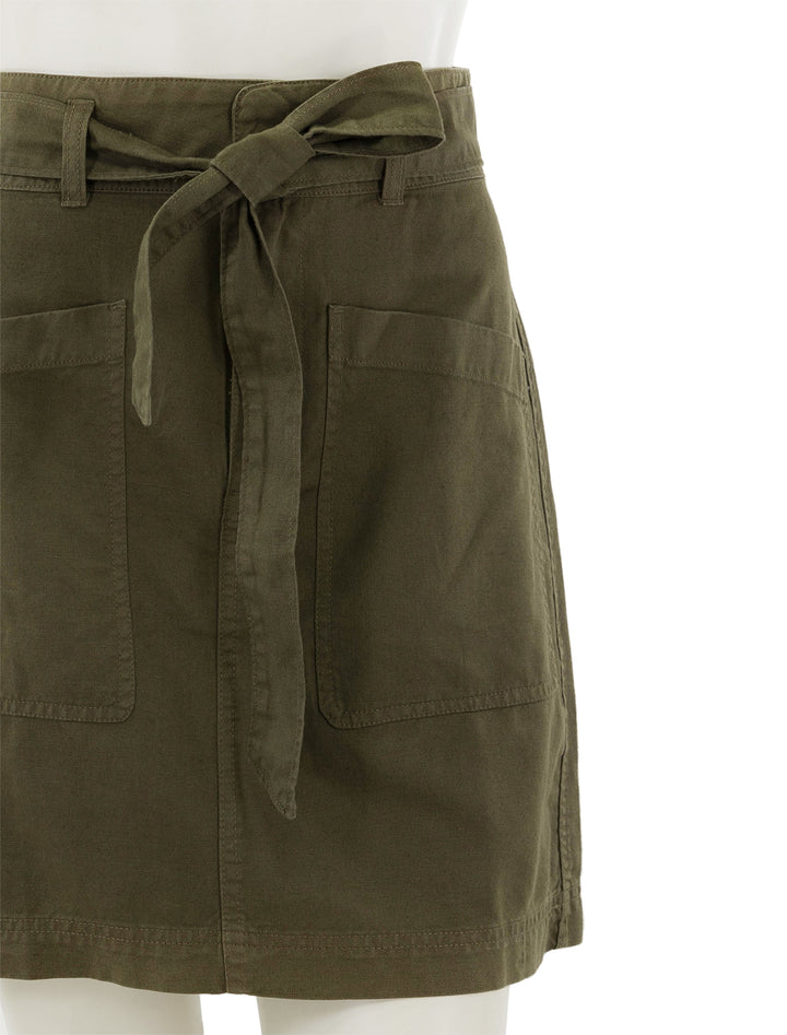 Close-up view of Faherty's palos verdes skirt in military olive.