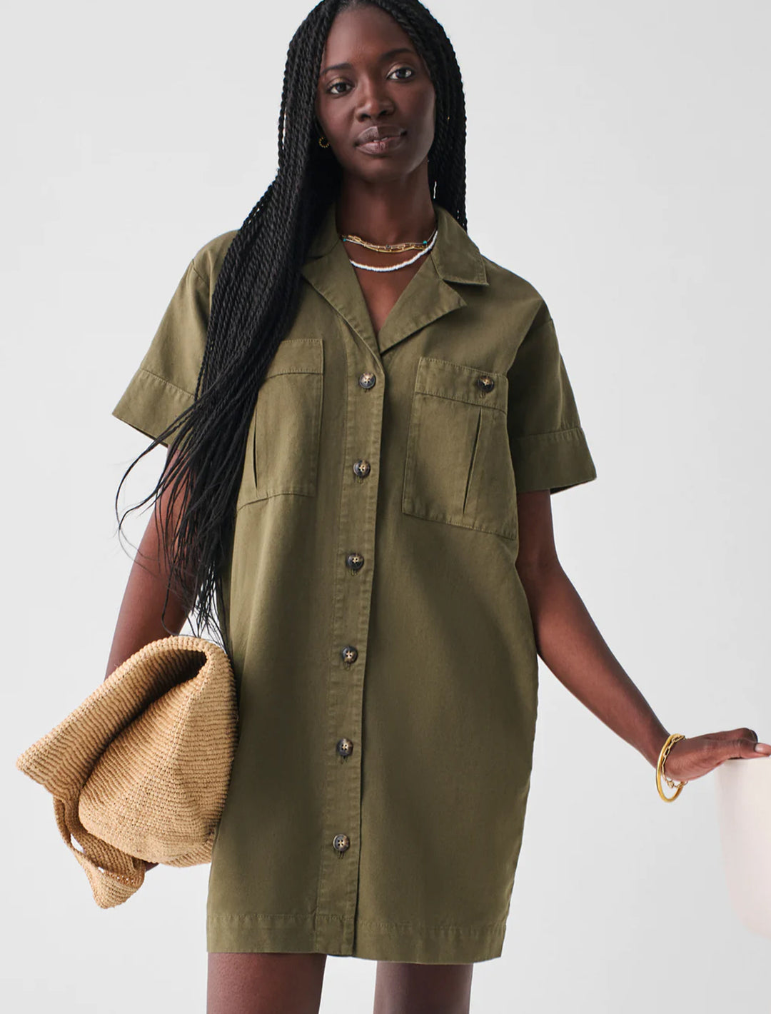 Model wearing Faherty's palos verdes dress in military olive.