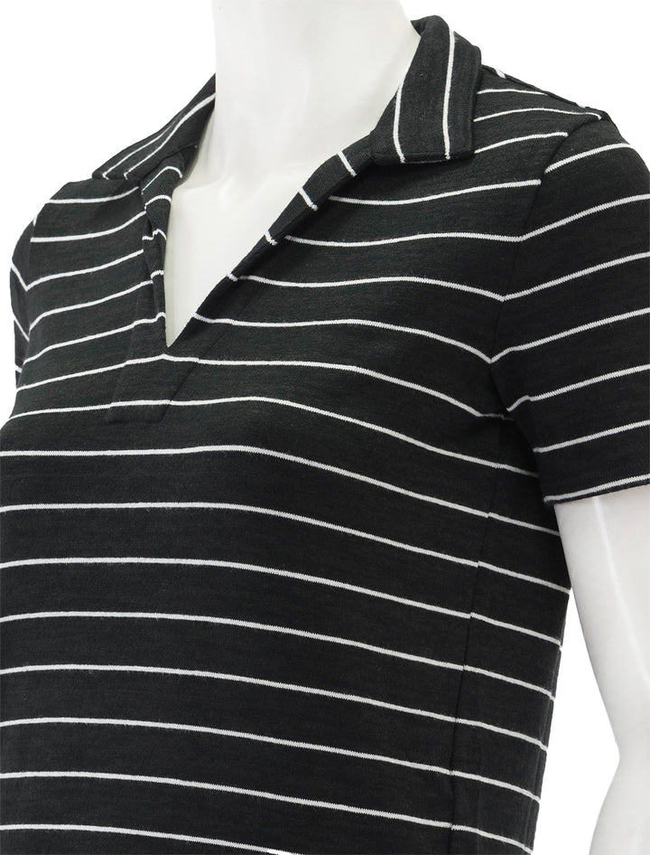 Close-up view of Rag & Bone's the knit stripe polo in black and white.