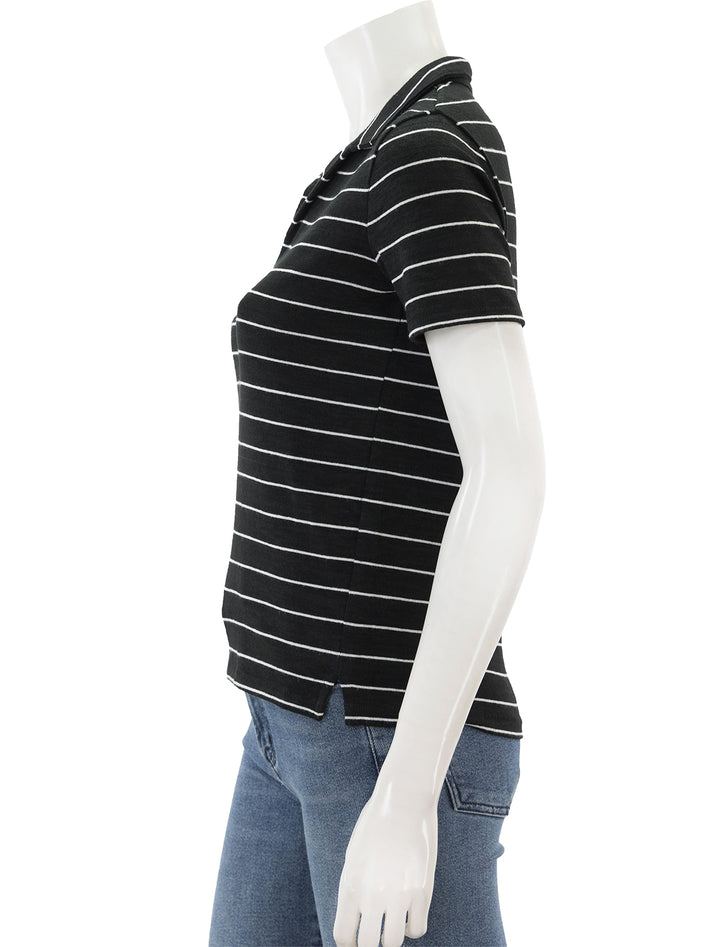 Side view of Rag & Bone's the knit stripe polo in black and white.