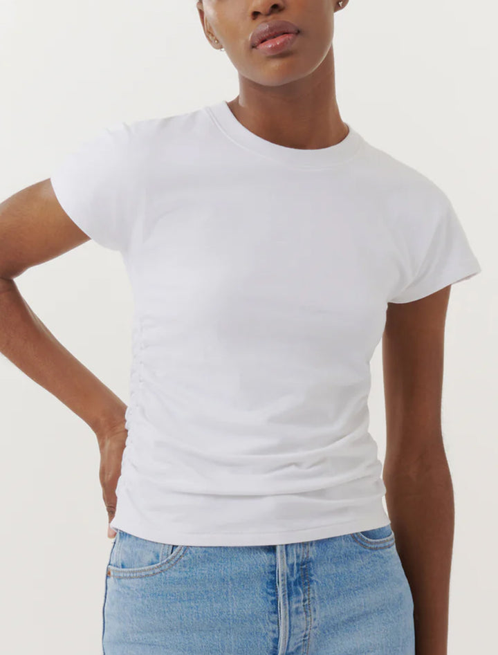 Model wearing ATM's pima cotton crew neck ruched tee in white.