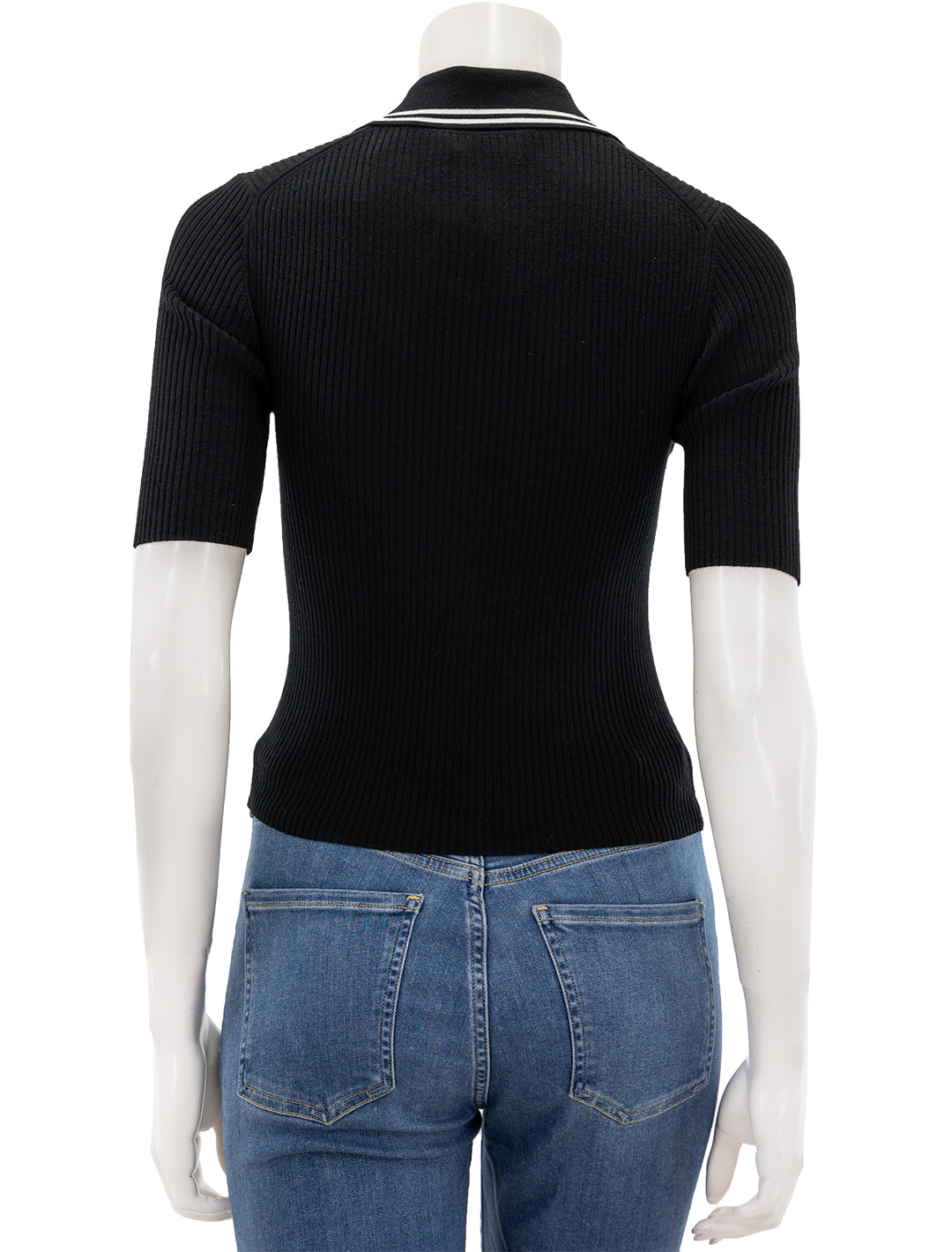 Back view of Theory's tipped rib polo in black and vachetta.