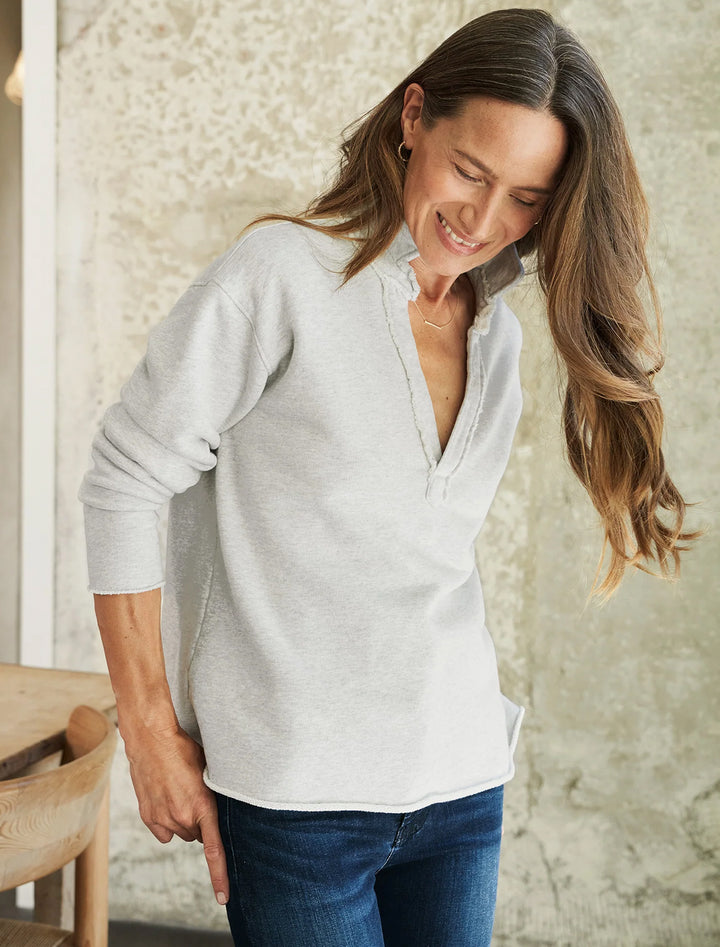 Model wearing Frank & Eileen's patrick popover henley in light heather grey melange.