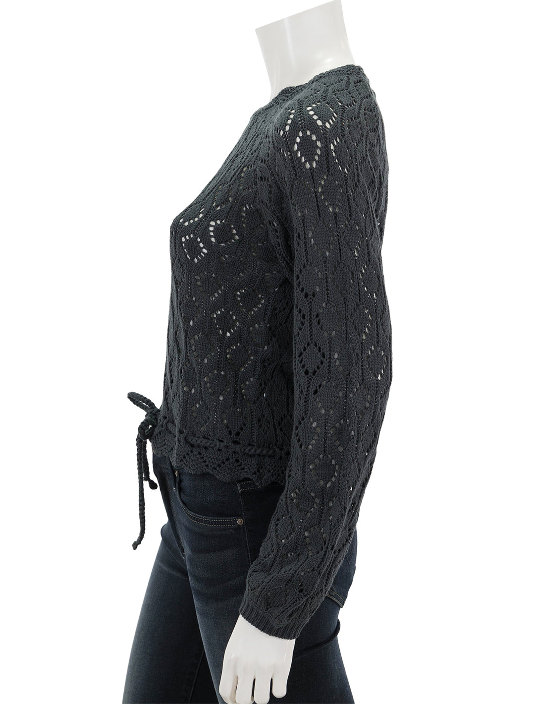 Side view of Marine Layer's manazanita crochet fringe sweater in black.