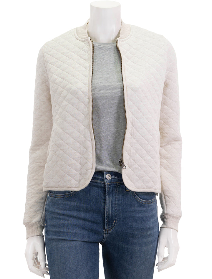 Front view of Marine Layer's corbet quilted bomber in oatmeal.