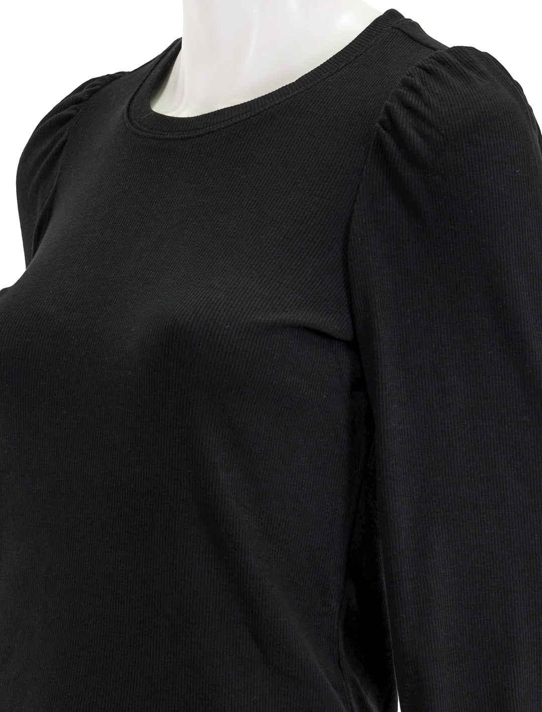 Close-up view of marine layer's lexi puff sleeve top in black.