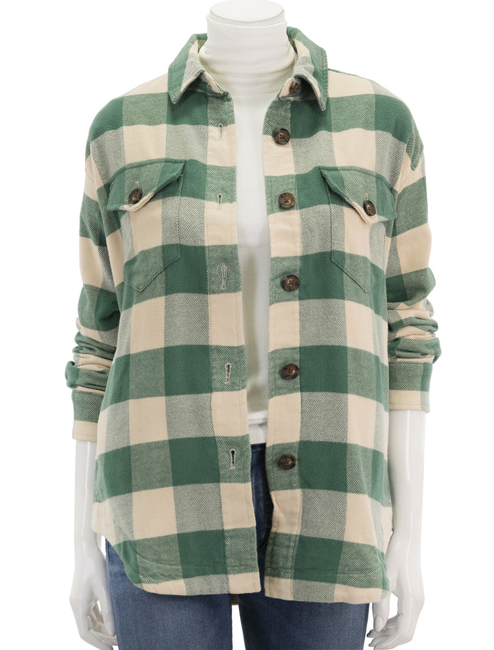 Front view of Marine Layer's bailey shirt jacket in green buffalo check, unbuttoned.
