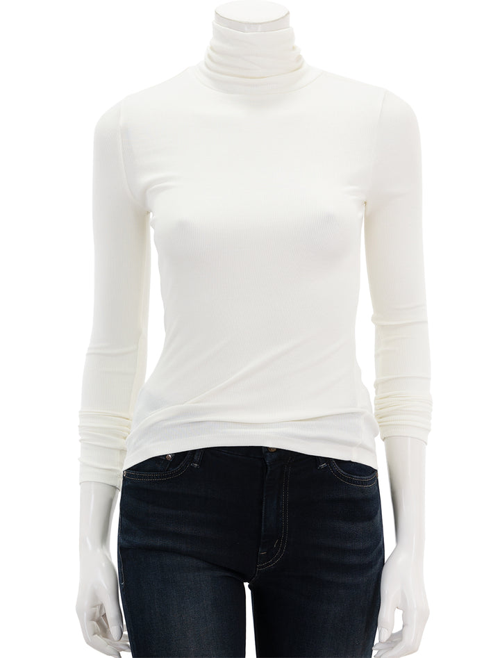 Front view of Marine Layer's lexi rib turtleneck in antique white.