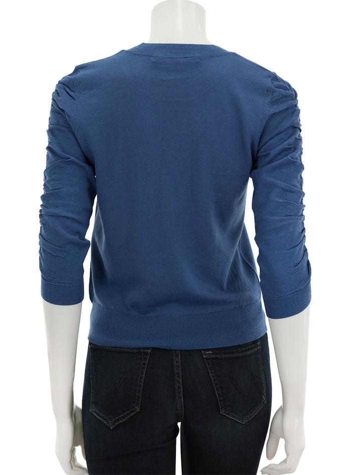 Back view of Veronica Beard's kase pullover in dark blue.