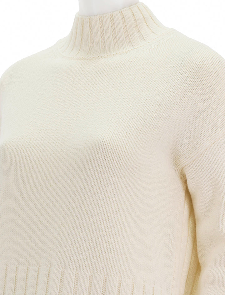 Close-up view of Barbour's winona pullover in antique white.