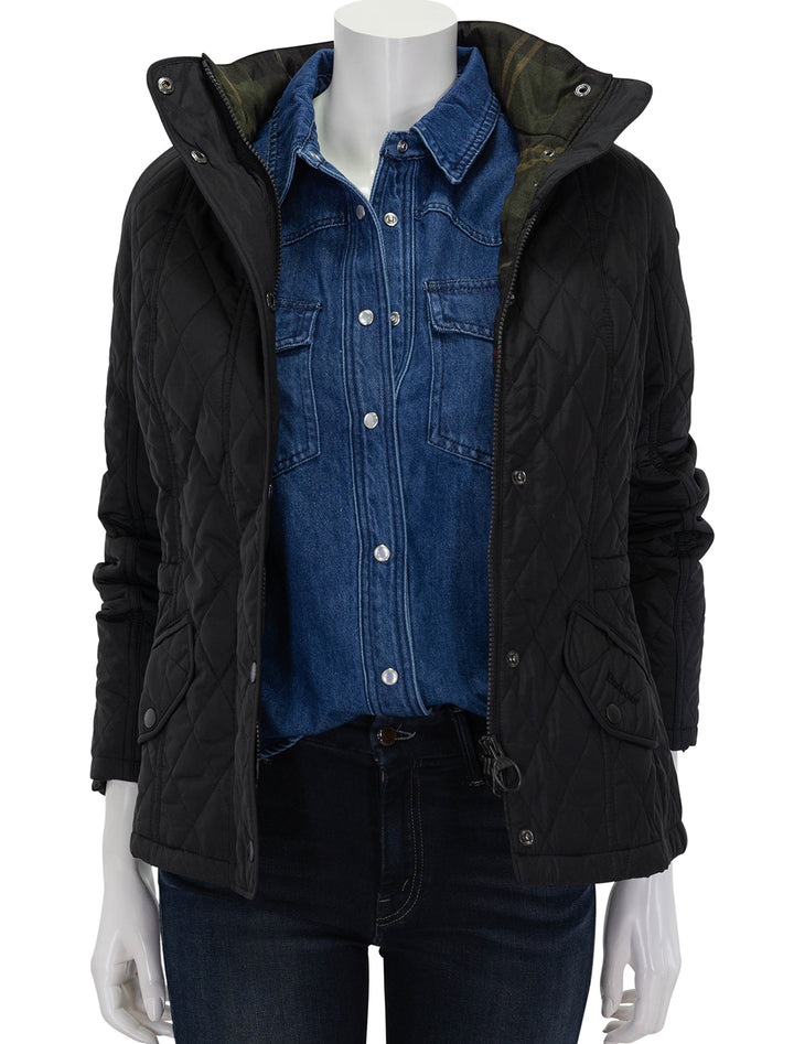 front view of millfire quilted jacket in black unzipped